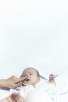 Mother touching nose of little cute newborn baby boy. Banner size photo