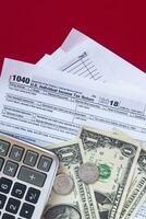 US Tax Forms.Tax forms background. The concept of tax settlement. photo