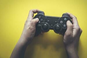 hand holding gamepad photo