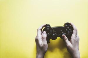 hand holding gamepad photo