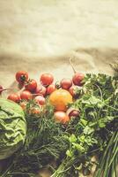 Healthy food background. Assortment of fresh vegetables on paper background photo