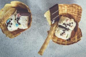 Delicious waffle with ice-cream. Summer food concept. Top view of yummy ice cream photo