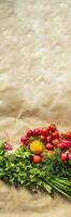 Healthy food background. Assortment of fresh vegetables on paper background photo