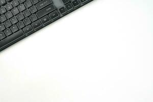 Black keyboard on white background photo