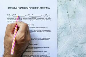 Filling durable financial Power of Attorney Form or POA document photo