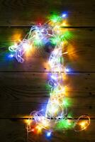 Number 1 made with the Christmas garland lights photo