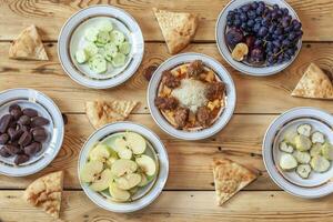 Table full with different foods photo