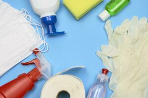 Cleaning and hygiene products on blue photo