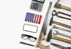 Working tools and office supplies on white photo