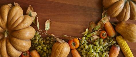 Autumn background with pumpkins and fruits photo