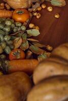 Autumn background with pumpkins and fruits photo