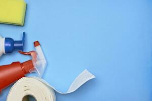 Cleaning and hygiene products on blue photo