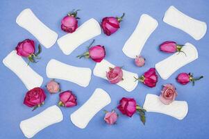 Feminine sanitary napkins with roses photo