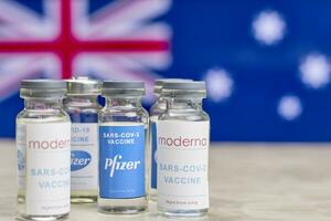Moderna and Pfizer Covid-19 vaccine trials. Australia government rollout mass immunization against coronavirus photo