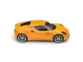 Fluorescent orange modern sports car - side view photo