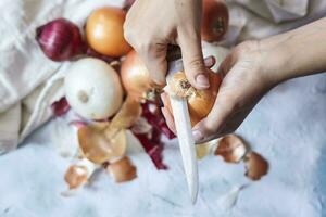 Cleaning fresh onions photo