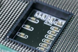 Macro-shot of computer microchip processor photo