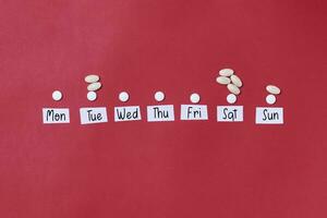 Week days and medical pill portions photo