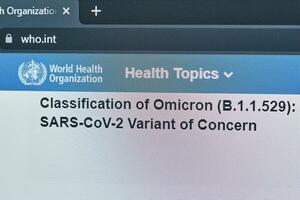 Tashkent, Uzbekistan - 27 November, 2021 WHO published first announcement about COVID-19 new variant called Omicron photo