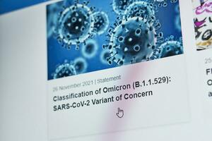 Tashkent, Uzbekistan - 27 November, 2021 WHO published first announcement about COVID-19 new variant called Omicron photo