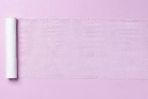 blanco vendaje en rosado foto