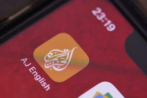 Al Jazeera English application on smartphone screen photo
