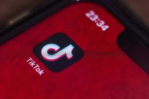 TikTok mobile application on smartphone screen photo