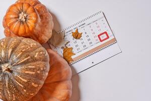 October 2021 monthly calendar and pumpkins photo