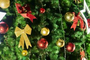 Festive Christmas tree background with decorations photo