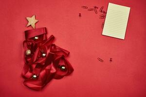 Red Christmas tree made with ribbon photo