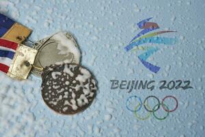 Olympic medals and Beijing 2022 Olympic Games symbol photo