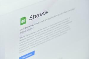 Google sheets web page on computer monitor photo