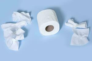 Toilet paper roll and hemorrhoidal suppositories photo