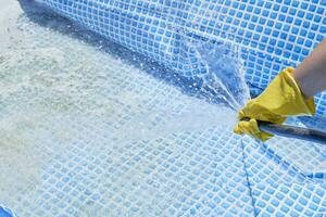 Cleaning home inflatable swimming pool photo