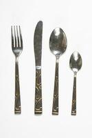 Restaurant eating items - Fork, spoon and knife photo