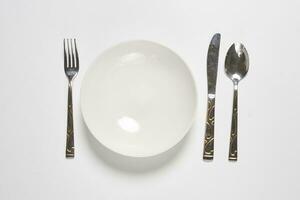 Restaurant eating items - Fork, spoon and knife photo