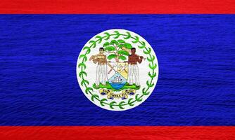 Flag and coat of arms of Belize on a textured background. Concept collage. photo