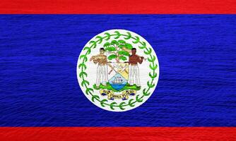 Flag and coat of arms of Belize on a textured background. Concept collage. photo