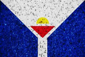 Flag of Collectivity of Saint Martin on a textured background. Concept collage. photo