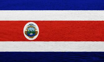 bandera y Saco de brazos de república de costa rica en un texturizado antecedentes. concepto collage. foto