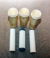 Clean water filters are ready for installation. The process of replacing the cartridges of a multi-stage water filter. photo