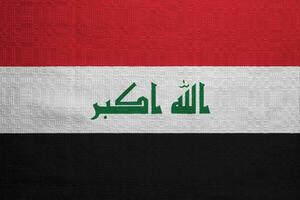 bandera de república de Irak en un texturizado antecedentes. concepto collage. foto