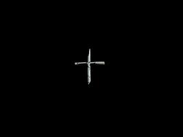 Wooden Cross On A Dark Background photo