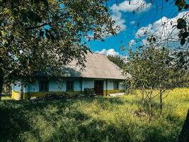 Ancient Hutsul Hut In Summer photo