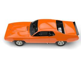 Amber orange vintage race car - top down side view photo