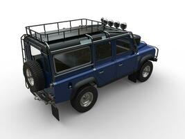 Dark blue off road vehicle - tail view photo