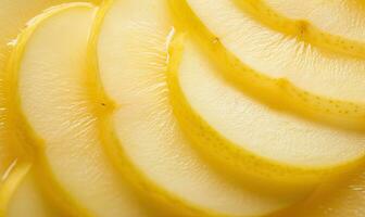 Close-up of vibrant yellow pear slices. Created by AI photo