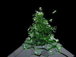 Abstract shape exploding into thousand small green glass pieces photo