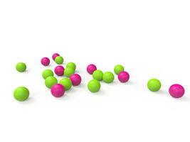 Bright green and pink spheres on white background photo