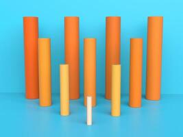 Orange cylinder columns on bright blue background photo